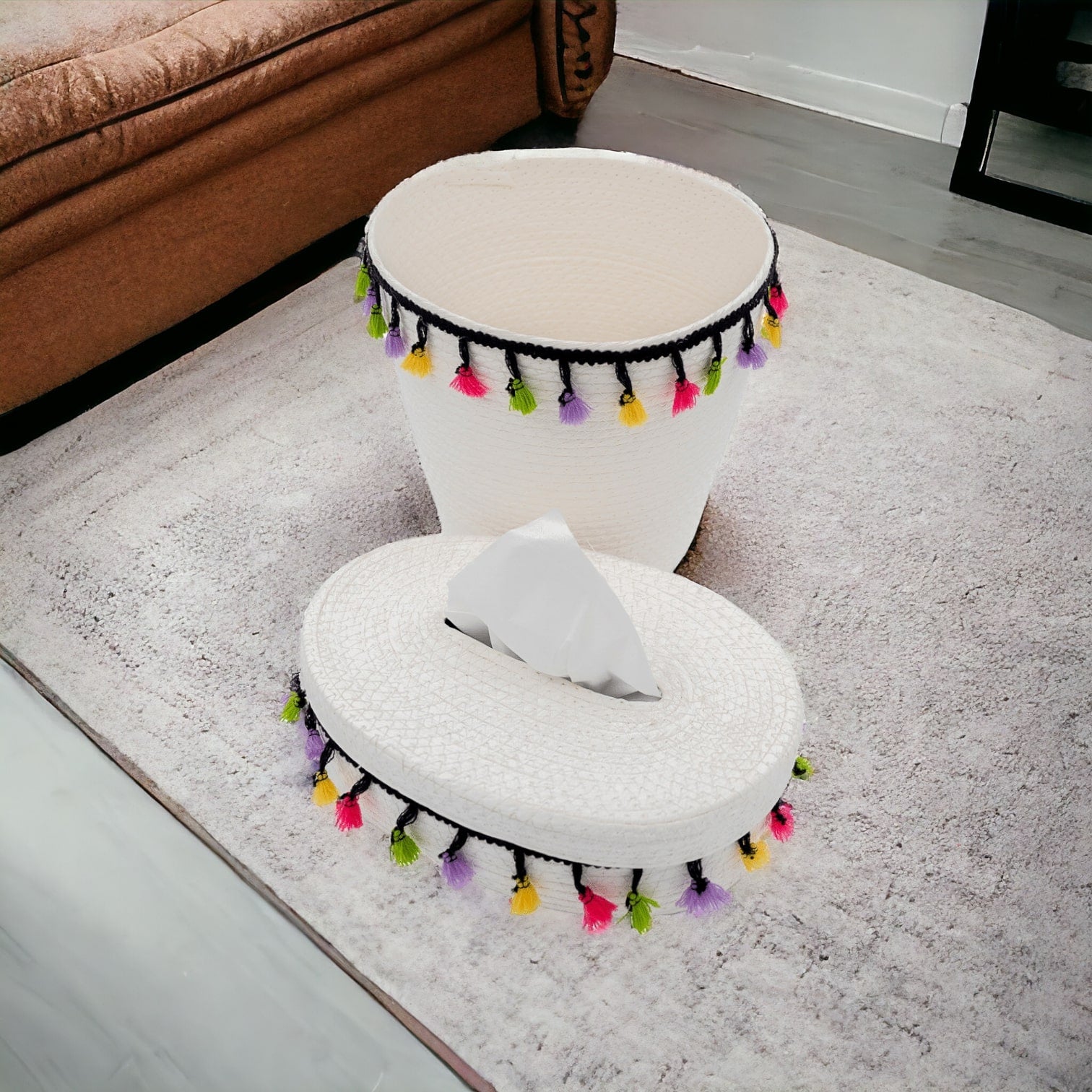 A set of wastebaskets and tissue boxes woven from natural materials 