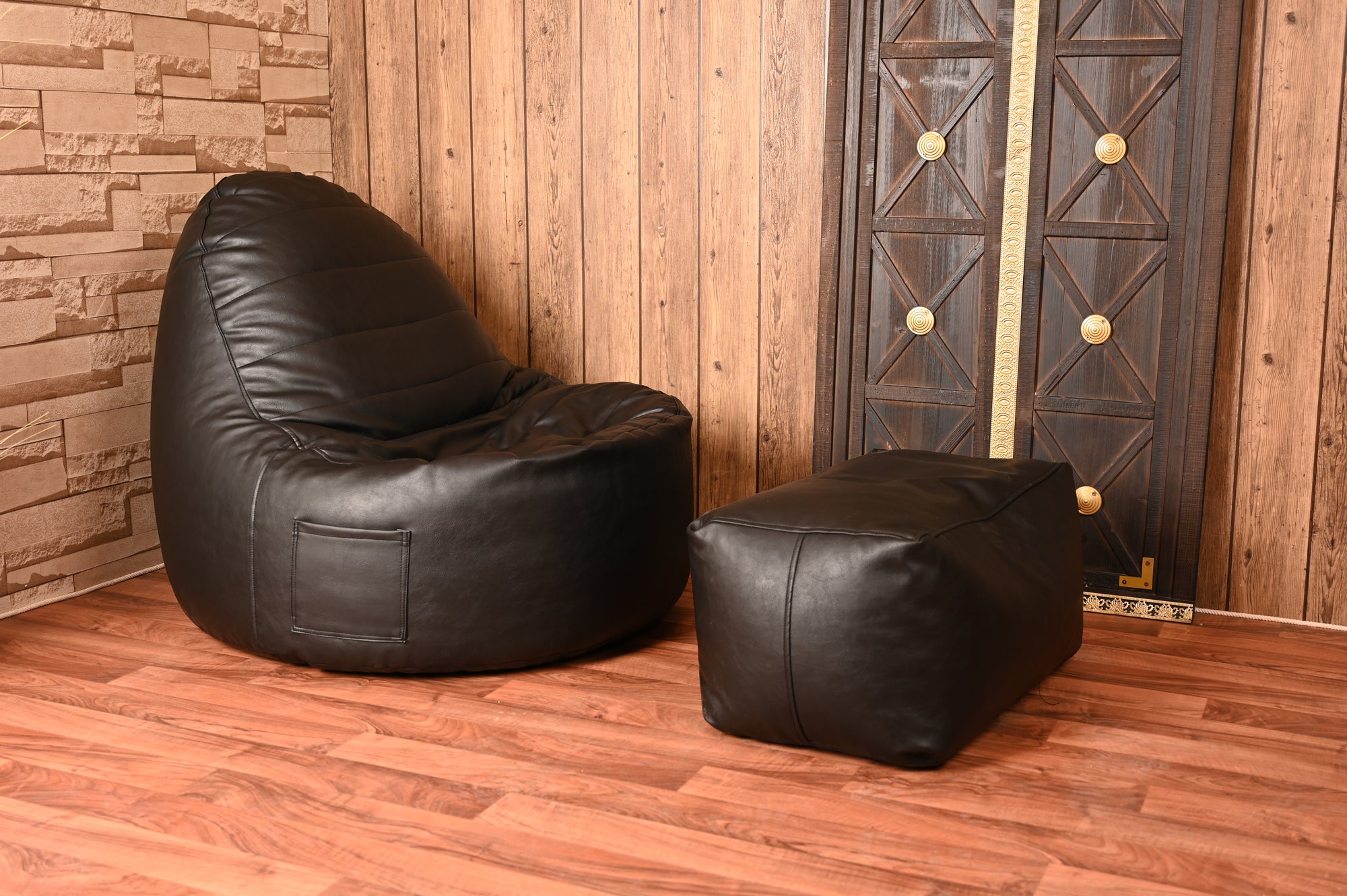 Anderson New Cone black leather bean bag + footrest